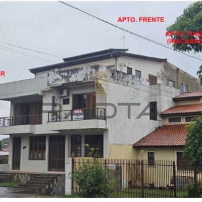 Sala comercial e dois apartamentos