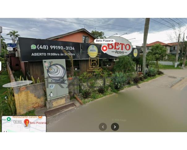 Foto de terreno com 1090,12m2 e 409,27 do prédio