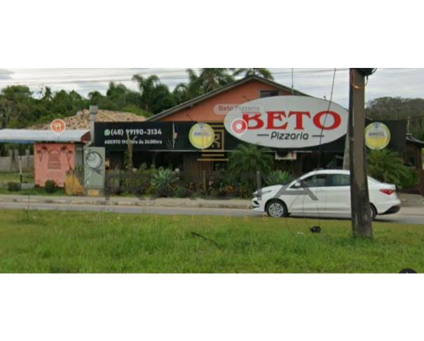 Foto de terreno com 1090,12m2 e 409,27 do prédio