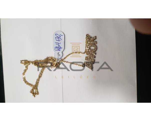 Foto de tres aneis um par brincos um colar  ouro 18k